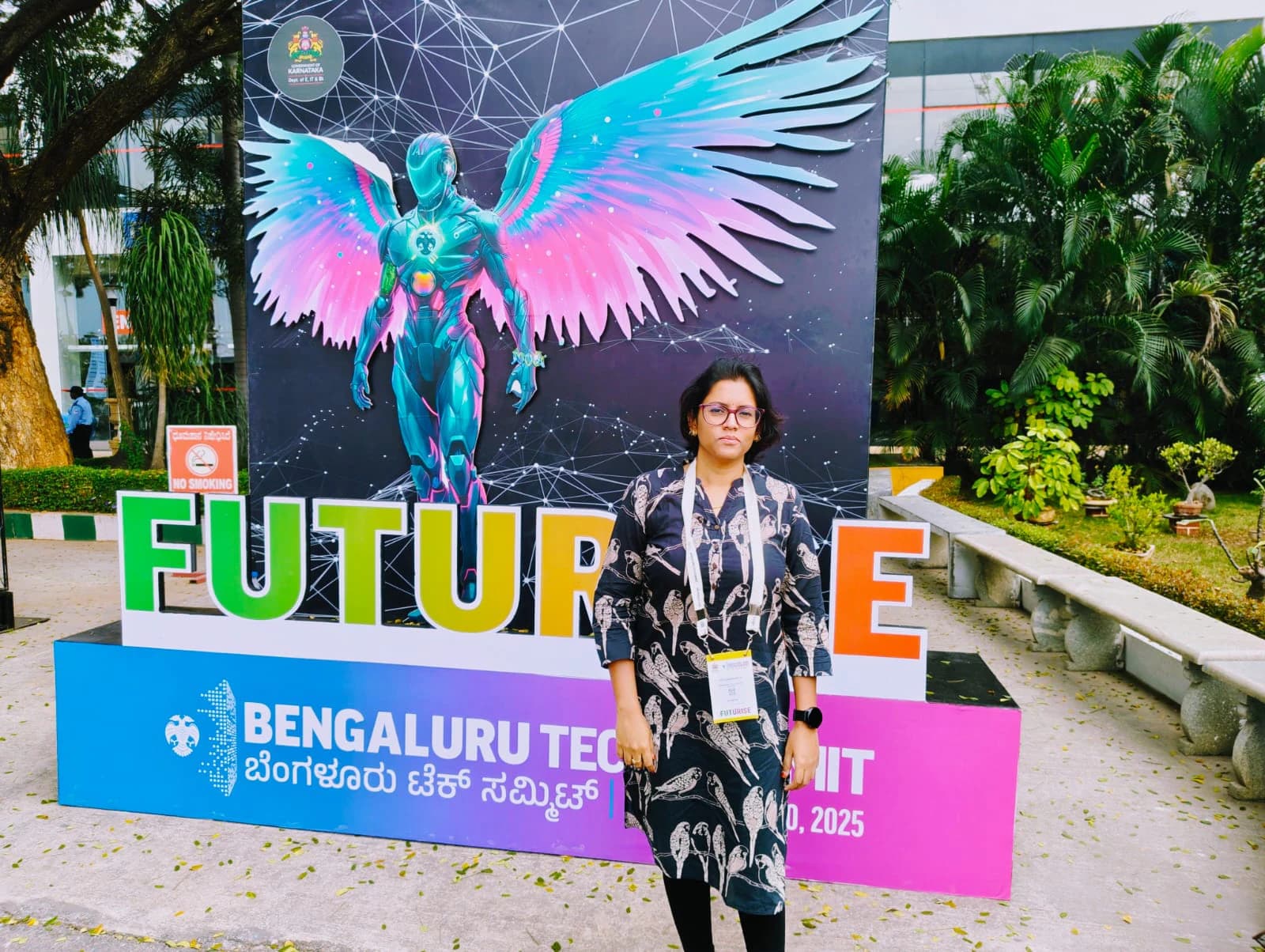 Priya standing at the Bengaluru Tech Summit